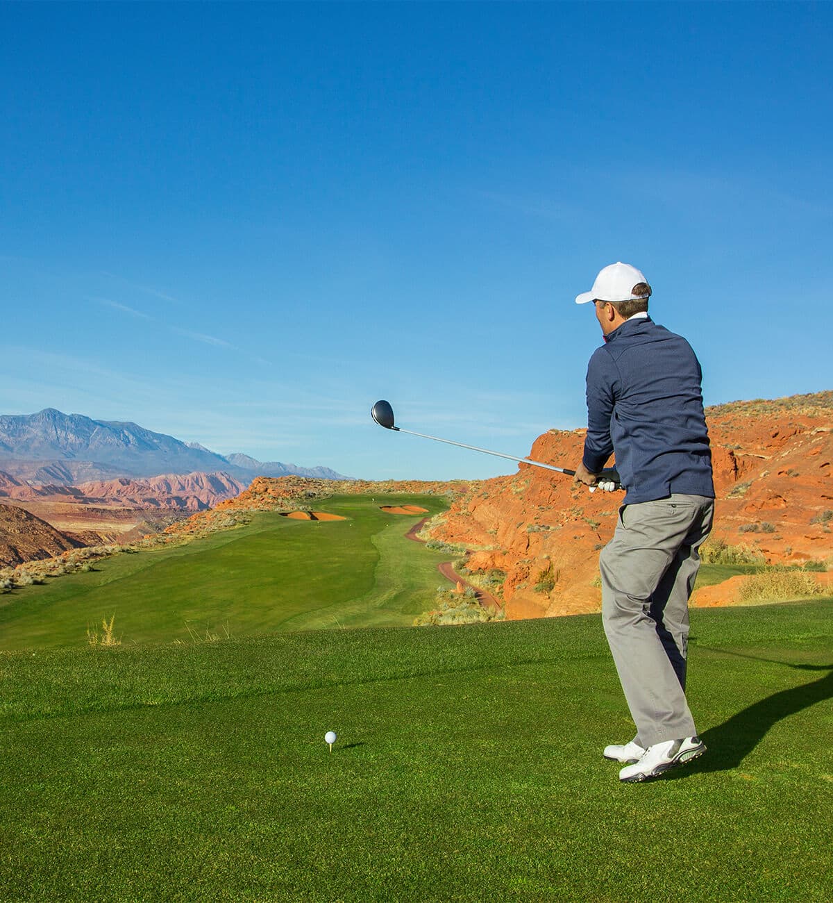person golfing