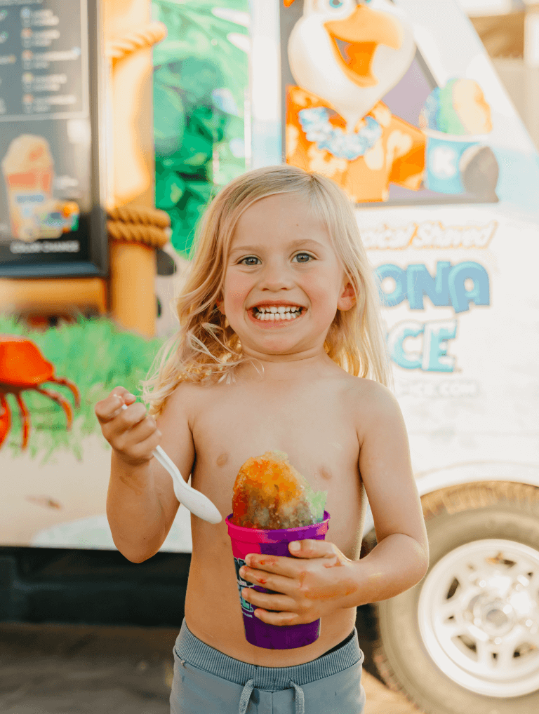 child with snowcone