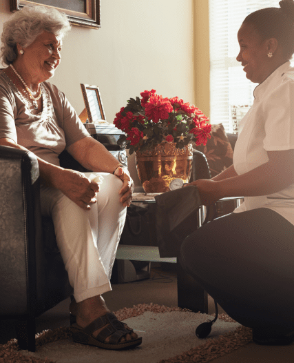 care taker with an elderly woman