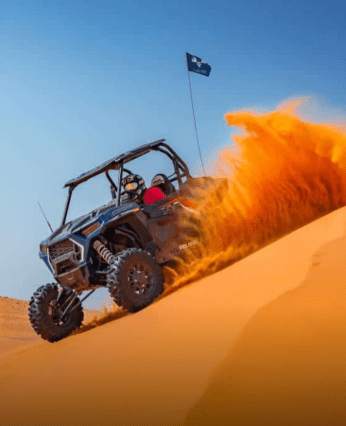 a ATV on a sand dune