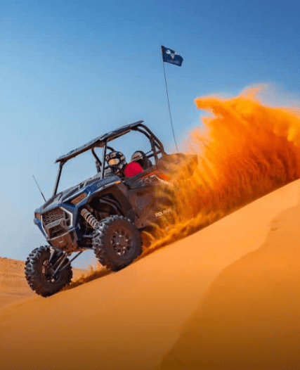 a ATV on a sand dune
