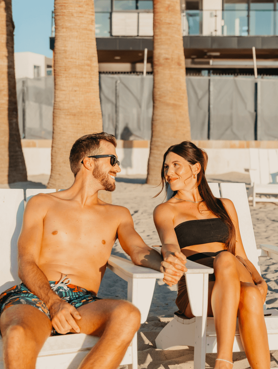 couple enjoying the beach at desert color